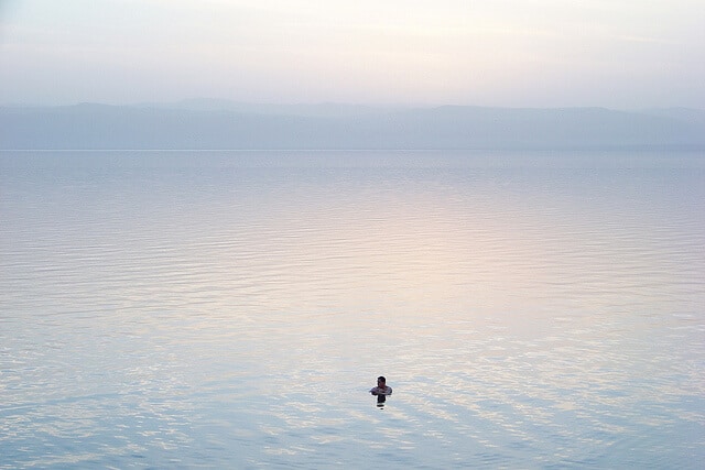 Man is Floating in the Dead Sea